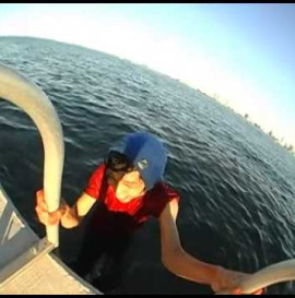 Skateboarder Falls Into The Ocean